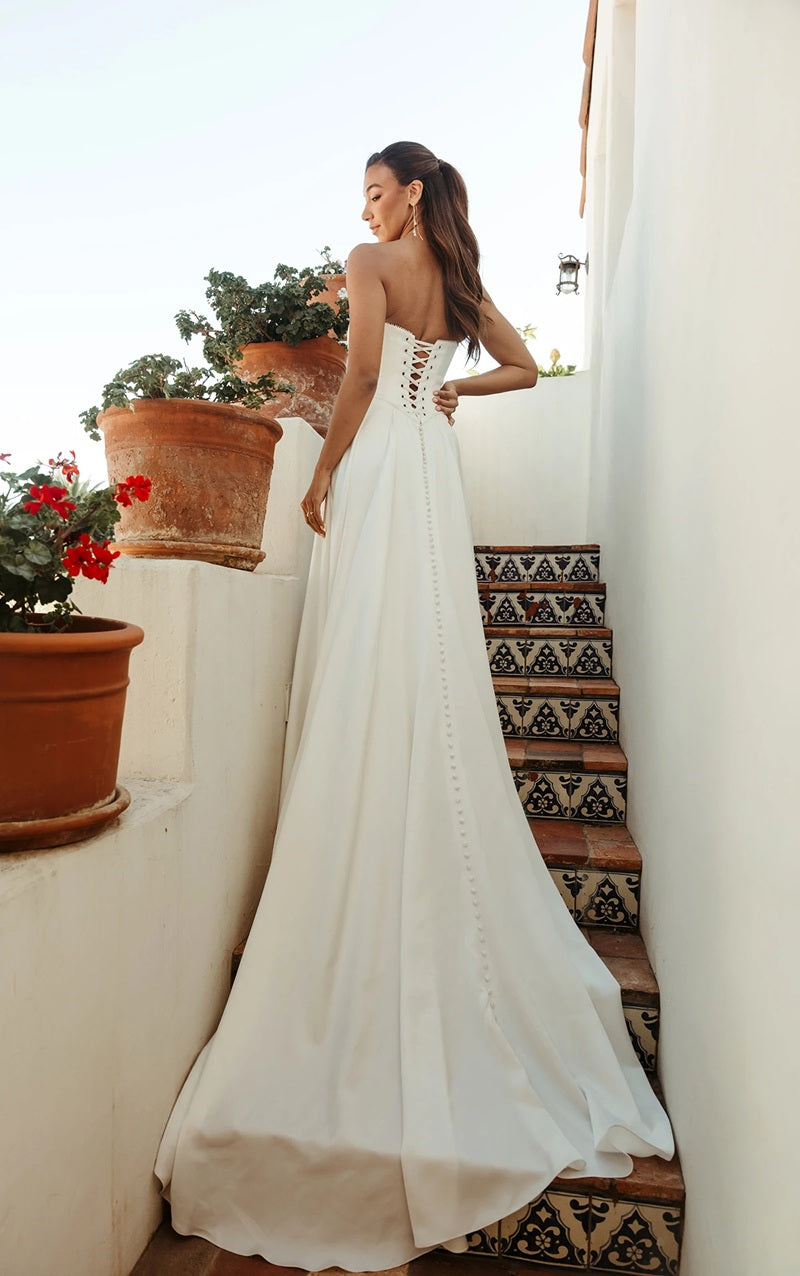 Strapless bridal gown with lace up back.