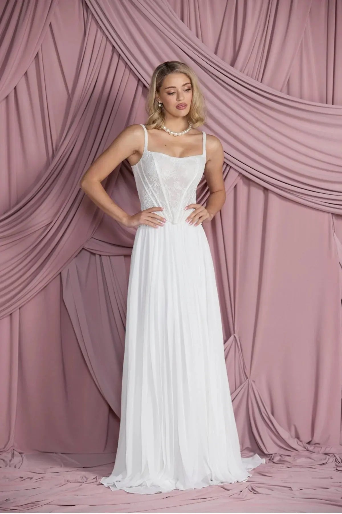 Front view of Larissa pleated chiffon bridal skirt in flowing A-line silhouette.