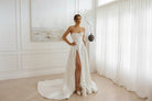 Bride wearing Emily two-piece wedding dress with pearl corset bodice and full satin A-line skirt